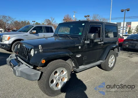 2013 Jeep Wrangler Sahara z USA, uszkodzony, nr VIN 1C4AJWBG5DL561698